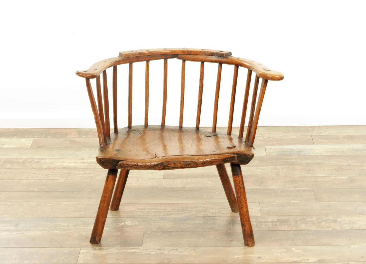 Lot 1216 - A GOOD EARLY 18TH CENTURY ELM PRIMITIVE WELSH STICK BACK CHAIR