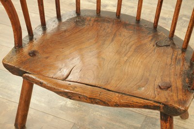 Lot 1216 - A GOOD EARLY 18TH CENTURY ELM PRIMITIVE WELSH STICK BACK CHAIR