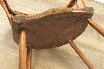 Lot 1216 - A GOOD EARLY 18TH CENTURY ELM PRIMITIVE WELSH STICK BACK CHAIR