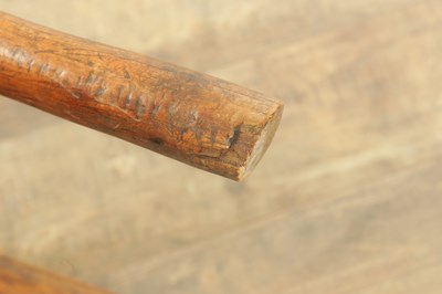 Lot 1216 - A GOOD EARLY 18TH CENTURY ELM PRIMITIVE WELSH STICK BACK CHAIR