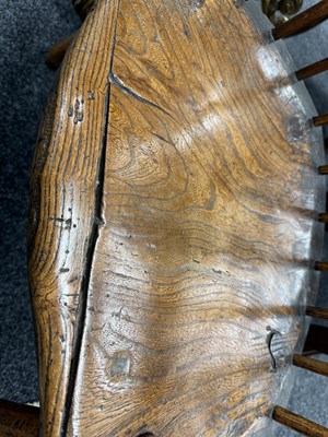 Lot 1216 - A GOOD EARLY 18TH CENTURY ELM PRIMITIVE WELSH STICK BACK CHAIR