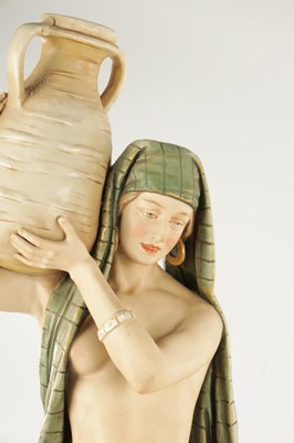 Lot 40 - A LARGE PAIR OF ROYAL DUX PORCELAIN FIGURES OF WATER CARRIERS