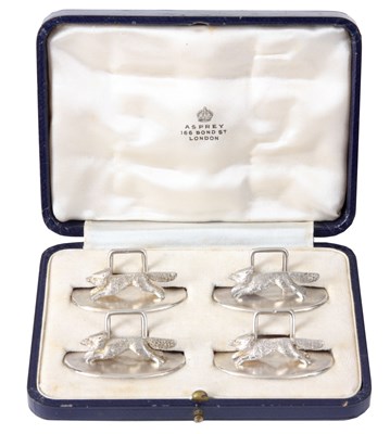 Lot 175 - A BOXED SET OF FOUR SILVER MENU HOLDERS BY...