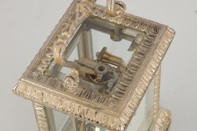 Lot 1471 - A 20TH CENTURY CAST SOLID SILVER CARRIAGE CLOCK