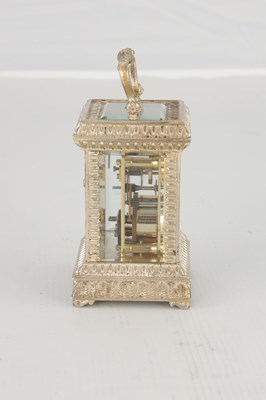 Lot 1471 - A 20TH CENTURY CAST SOLID SILVER CARRIAGE CLOCK