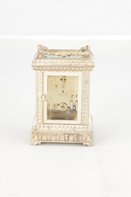 Lot 1471 - A 20TH CENTURY CAST SOLID SILVER CARRIAGE CLOCK