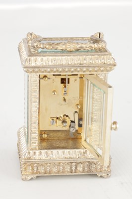 Lot 1471 - A 20TH CENTURY CAST SOLID SILVER CARRIAGE CLOCK