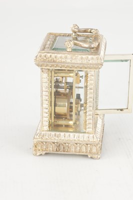 Lot 1471 - A 20TH CENTURY CAST SOLID SILVER CARRIAGE CLOCK
