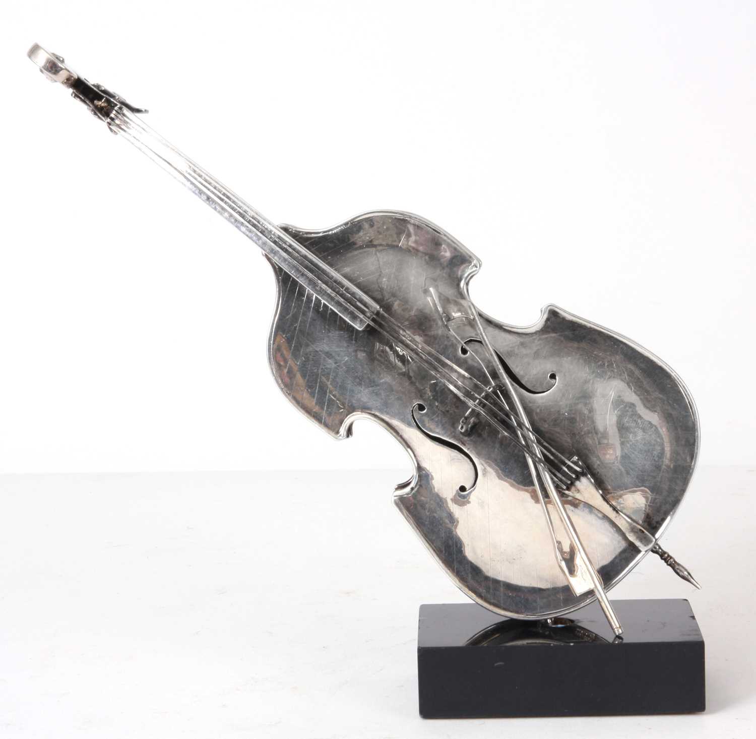 Lot 185 - A SOLID SILVER SCULPTURE FORMED AS A DOUBLE...