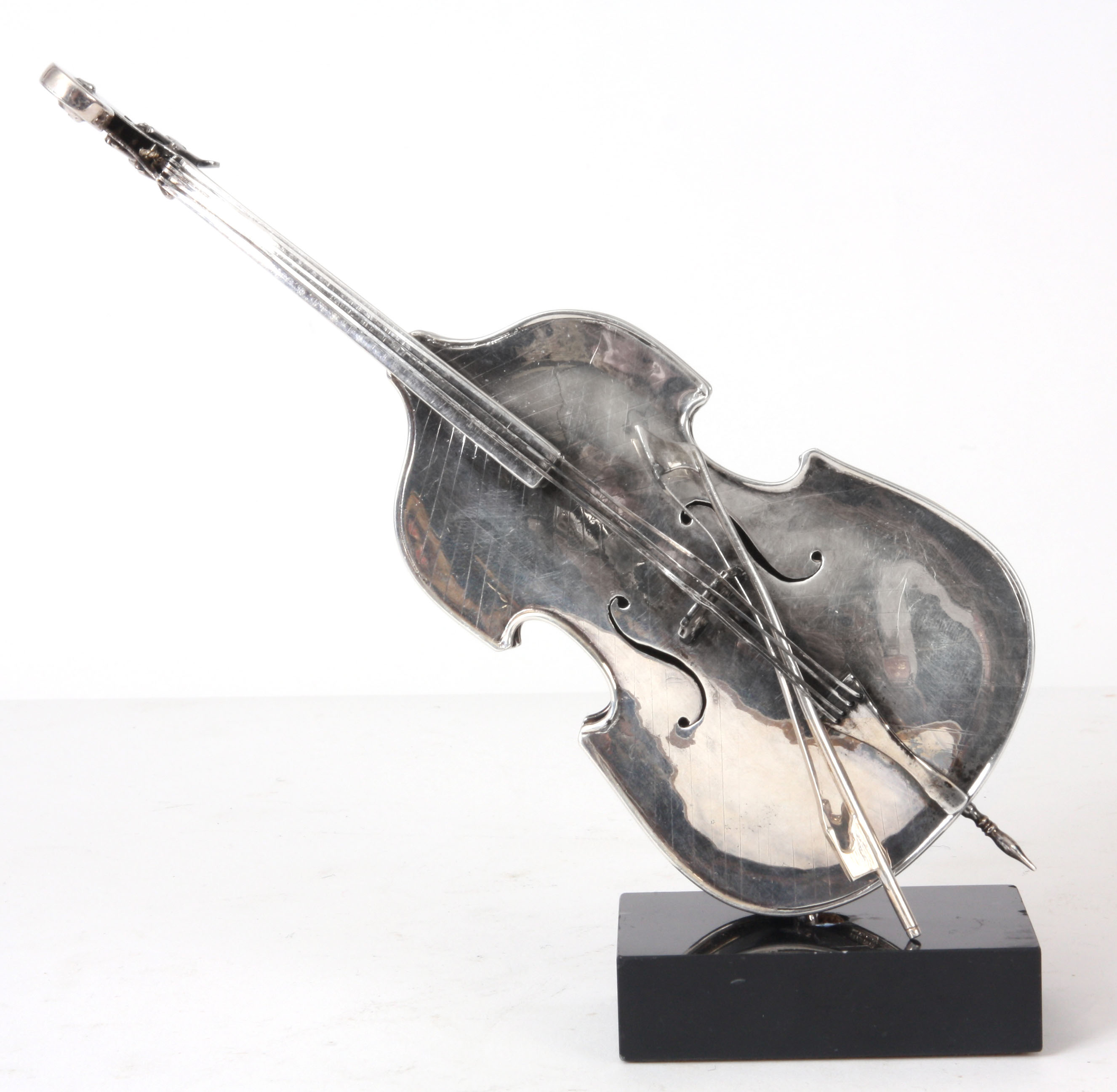 Lot 185 A SOLID SILVER SCULPTURE FORMED AS A DOUBLE