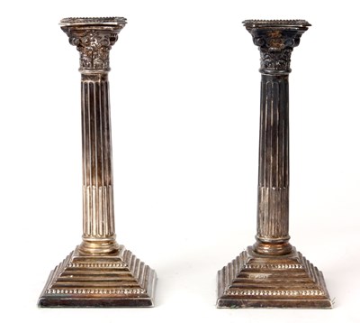 Lot 188 - A PAIR OF SILVER CANDLESTICKS of classical...