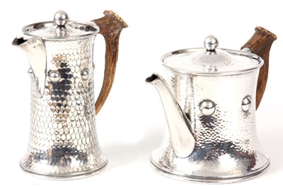 Lot 190 - AN ARTS AND CRAFTS STYLE TEA AND COFFEE POT...