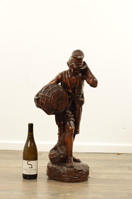 Lot 1109 - A 19TH CENTURY CONTINENTAL CARVED WOOD FIGURE OF BLACK FOREST TYPE