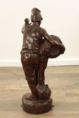 Lot 1109 - A 19TH CENTURY CONTINENTAL CARVED WOOD FIGURE OF BLACK FOREST TYPE