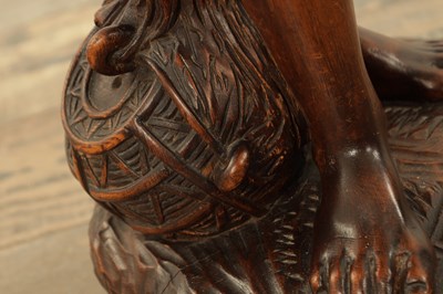Lot 1109 - A 19TH CENTURY CONTINENTAL CARVED WOOD FIGURE OF BLACK FOREST TYPE