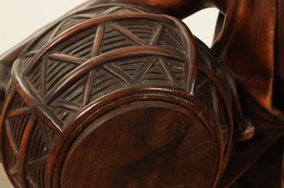 Lot 1109 - A 19TH CENTURY CONTINENTAL CARVED WOOD FIGURE OF BLACK FOREST TYPE