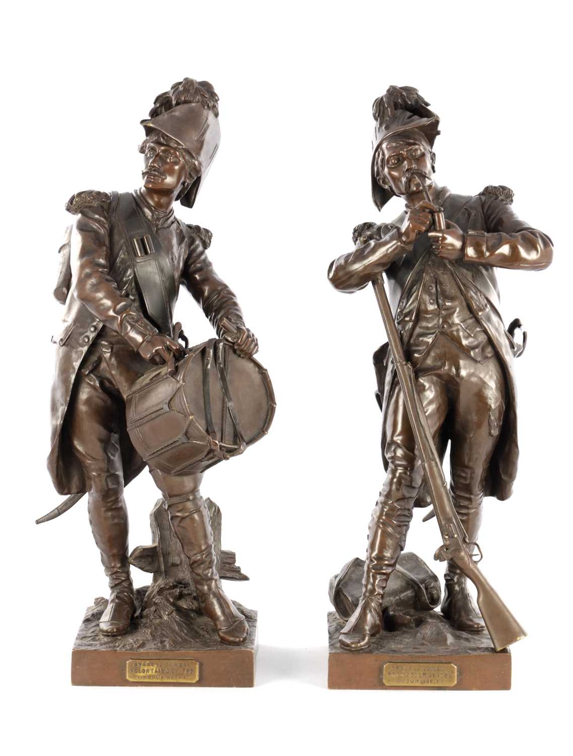Lot 735 - AFTER ETIENNE-HENRI DUMAIGE. A LARGE PAIR OF LATE 19TH CENTURY FRENCH PATINATED BRONZE MILITARY FIGURES