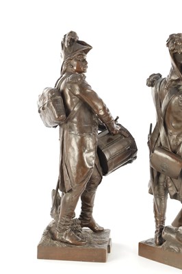 Lot 735 - AFTER ETIENNE-HENRI DUMAIGE. A LARGE PAIR OF LATE 19TH CENTURY FRENCH PATINATED BRONZE MILITARY FIGURES