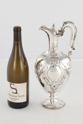 Lot 188 - A LARGE FINE VICTORIAN EMBOSSED SILVER EWER