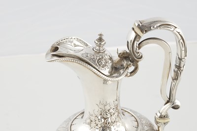 Lot 188 - A LARGE FINE VICTORIAN EMBOSSED SILVER EWER