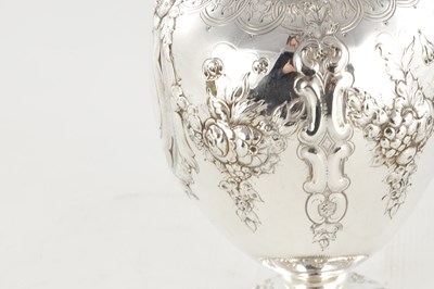 Lot 188 - A LARGE FINE VICTORIAN EMBOSSED SILVER EWER
