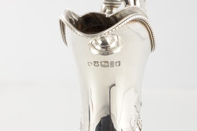 Lot 188 - A LARGE FINE VICTORIAN EMBOSSED SILVER EWER