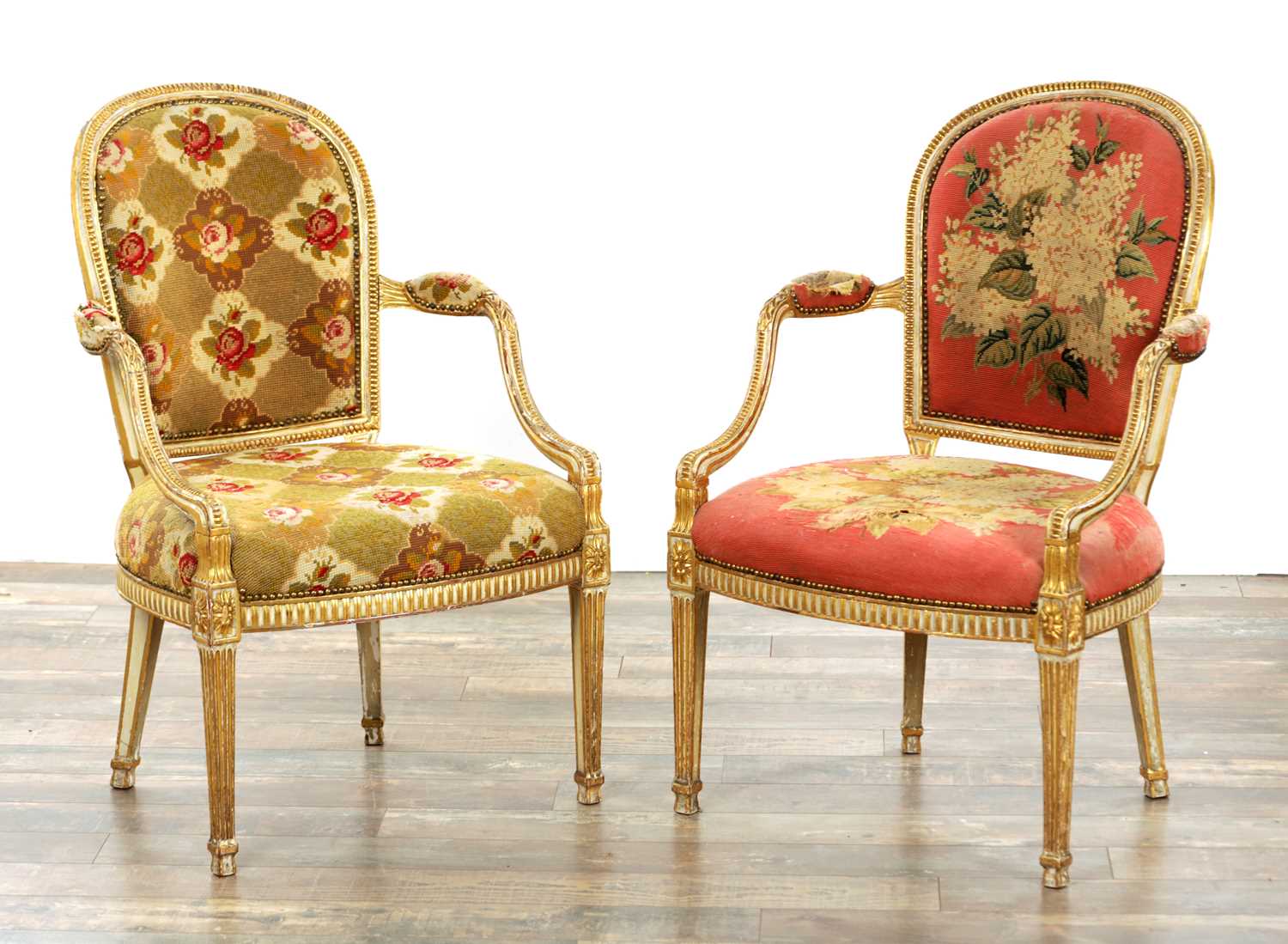 Lot 1283 - A PAIR OF LATE 18TH CENTURY ENGLISH PAINTED AND PARCEL GILT UPHOLSTERED CHAIRS