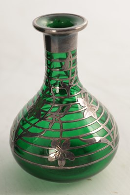 Lot 31 - THREE 20TH CENTURY GREEN GLASS VASES