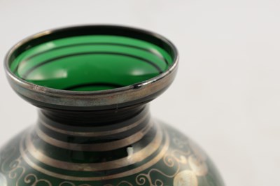 Lot 31 - THREE 20TH CENTURY GREEN GLASS VASES