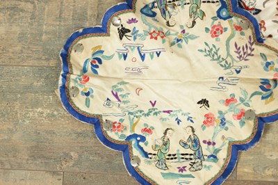 Lot 136 - A CHINESE IVORY SILK HAND EMBROIDERED ROBE