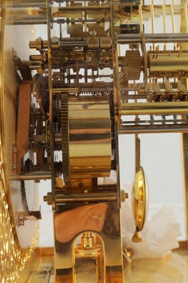 Lot 1628 - A 20TH CENTURY KIENINGER GOLD PLATED MOONPHASE TABLE CLOCK