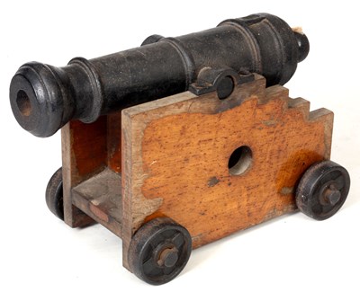 Lot 218 - A 19th CENTURY CAST IRON STARTING CANON on a...
