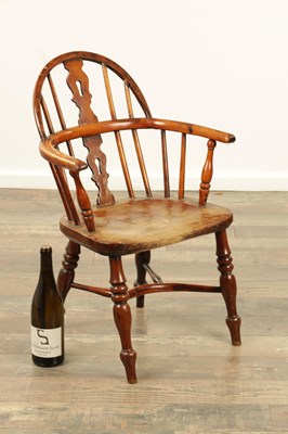 Lot 1366 - A 19TH CENTURY YEW WOOD CHILDS WINDSOR CHAIR