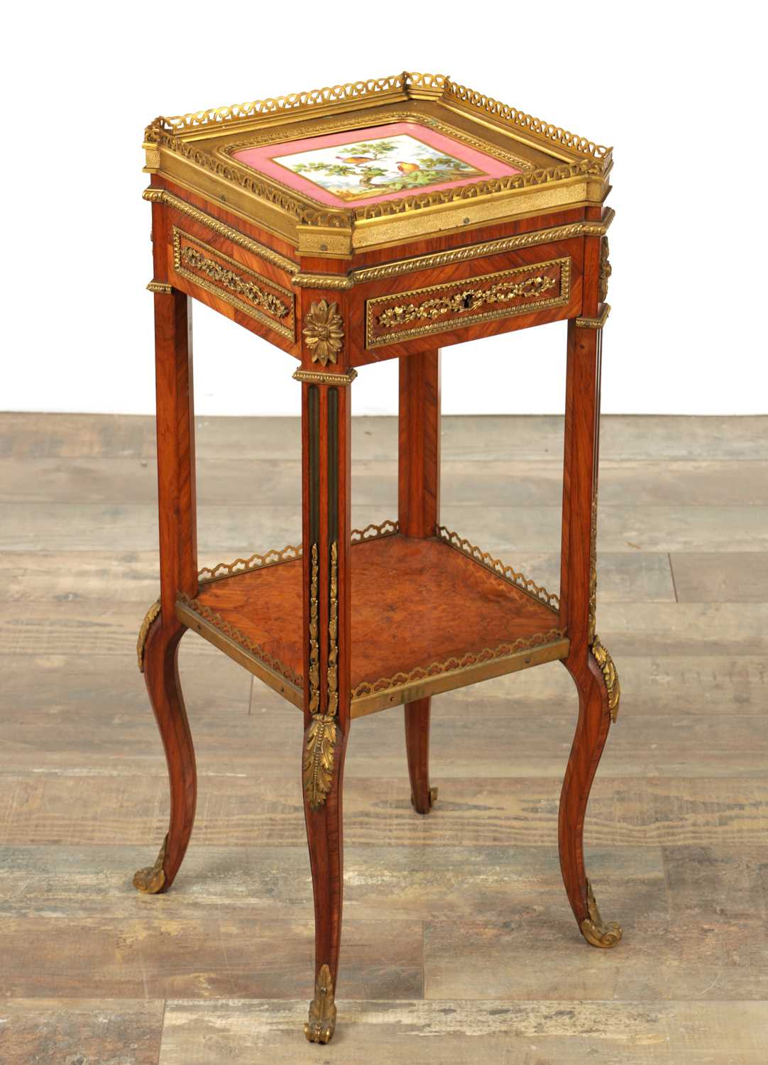 Lot 1171 - A GOOD 19TH CENTURY FRENCH KINGWOOD AND ORMOLU MOUNTED LAMP TABLE WITH INSET SEVRES PORCELAIN PANELLED TOP