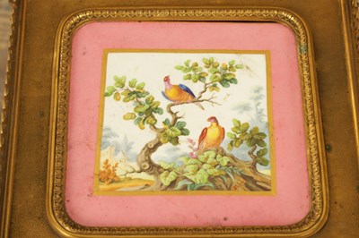 Lot 1171 - A GOOD 19TH CENTURY FRENCH KINGWOOD AND ORMOLU MOUNTED LAMP TABLE WITH INSET SEVRES PORCELAIN PANELLED TOP