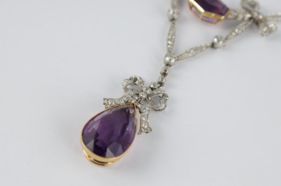 Lot 603 - AN EDWARDIAN PLATINUM AMETHYST & DIAMOND PENDANT NECKLACE
