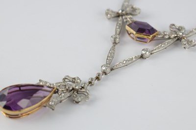 Lot 603 - AN EDWARDIAN PLATINUM AMETHYST & DIAMOND PENDANT NECKLACE