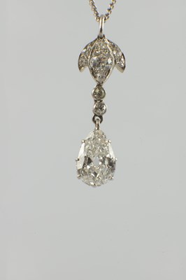Lot 600 - A PLATINUM AND DIAMOND PEAR-SHAPED PENDANT NECKLACE