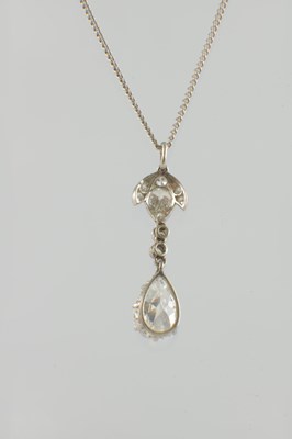 Lot 600 - A PLATINUM AND DIAMOND PEAR-SHAPED PENDANT NECKLACE