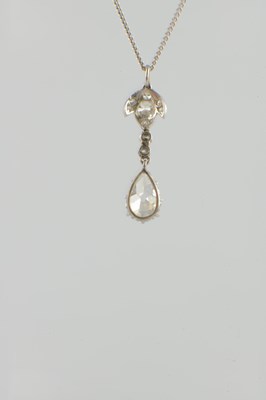 Lot 600 - A PLATINUM AND DIAMOND PEAR-SHAPED PENDANT NECKLACE