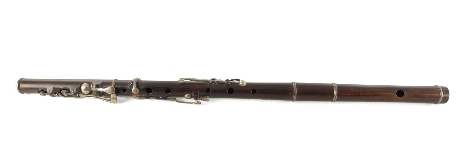 Lot 705 - AN EARLY 19TH CENTURY CHARLES NICHOLSON 'IMPROVED' COCUS WOOD FLUTE BY THOMAS PROWSE