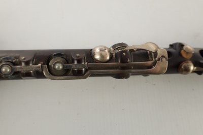 Lot 705 - AN EARLY 19TH CENTURY CHARLES NICHOLSON 'IMPROVED' COCUS WOOD FLUTE BY THOMAS PROWSE