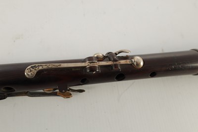 Lot 705 - AN EARLY 19TH CENTURY CHARLES NICHOLSON 'IMPROVED' COCUS WOOD FLUTE BY THOMAS PROWSE