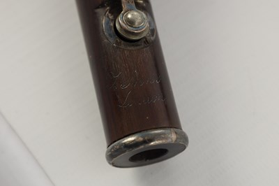 Lot 705 - AN EARLY 19TH CENTURY CHARLES NICHOLSON 'IMPROVED' COCUS WOOD FLUTE BY THOMAS PROWSE