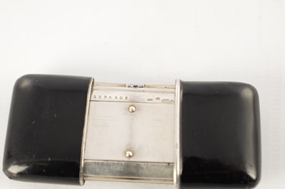 Lot 1427 - AN EARLY 20TH CENTURY SWISS MOVADO ERMETO SILVER ENAMEL TRAVEL WATCH