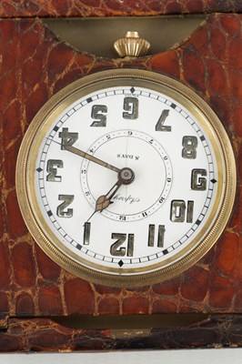 Lot 1409 - AN EARLY 20TH CENTURY CROCODILE SKIN ASPREY TRAVELING ALARM CLOCK