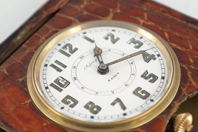 Lot 1409 - AN EARLY 20TH CENTURY CROCODILE SKIN ASPREY TRAVELING ALARM CLOCK