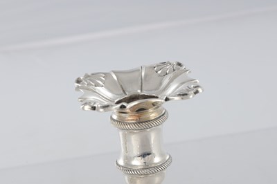 Lot 226 - A PAIR OF GEORGE III CAST SILVER CANDLESTICKS
