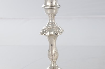 Lot 226 - A PAIR OF GEORGE III CAST SILVER CANDLESTICKS