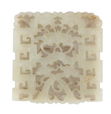 Lot 447 - A CHINESE CARVED JADE BROOCH